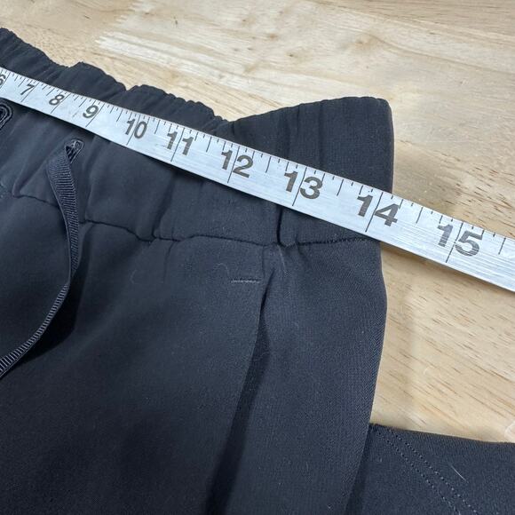 Lululemon On The Fly Crop Woven 23" Black Women's Size 4 Good Used Condition - Picture 7 of 9